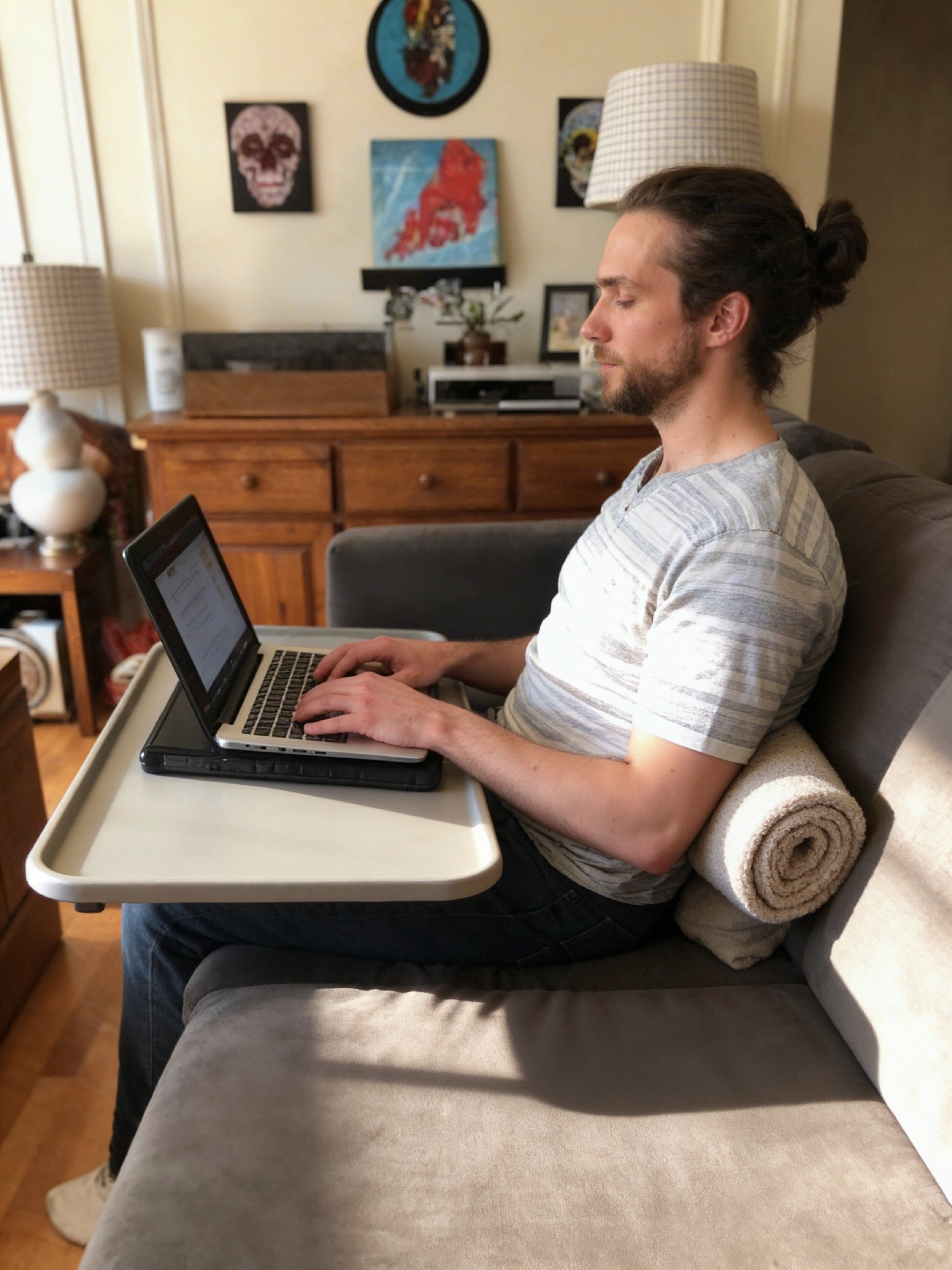 freepik__person-working-on-a-couch-sitting-on-a-firm-cushio__63047.jpeg